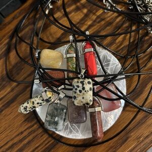 Assorted Crystal Gemstone Pendant Necklaces on leather